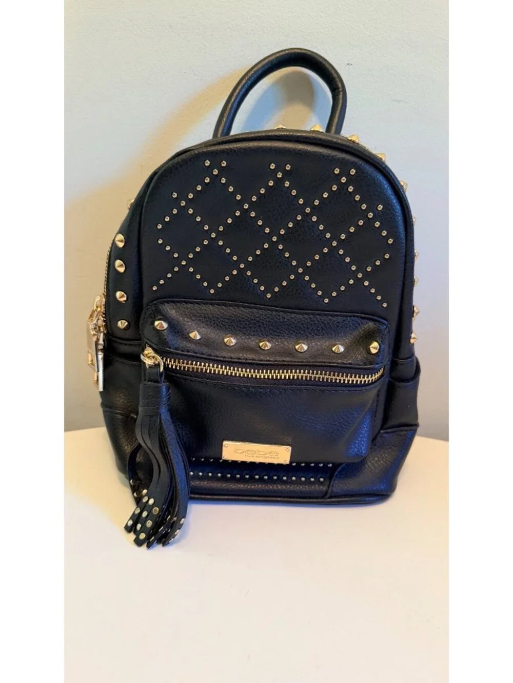 Bebe Black Mini Backpack Purse With Gold Studs & Tassel Accent
